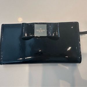 Kate Spade wallet with buckle closure